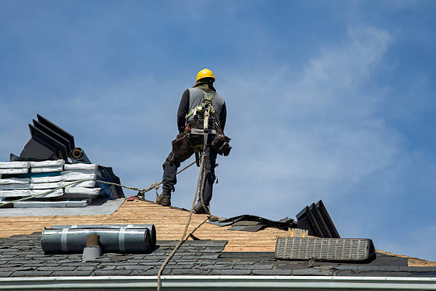 Professional Roofing technician working in Woodland, MS